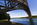 The colossal curving arch of Britannia Bridge spanning the Menai Strait, Gwynedd, North Wales
